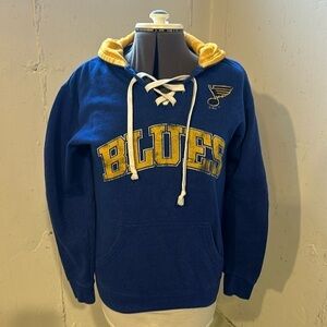 NHL Blues hockey sweatshirt hoodie kangaroo pockets lace up top yellow and blue